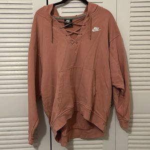Medium size Nike hoodie. Salmon color